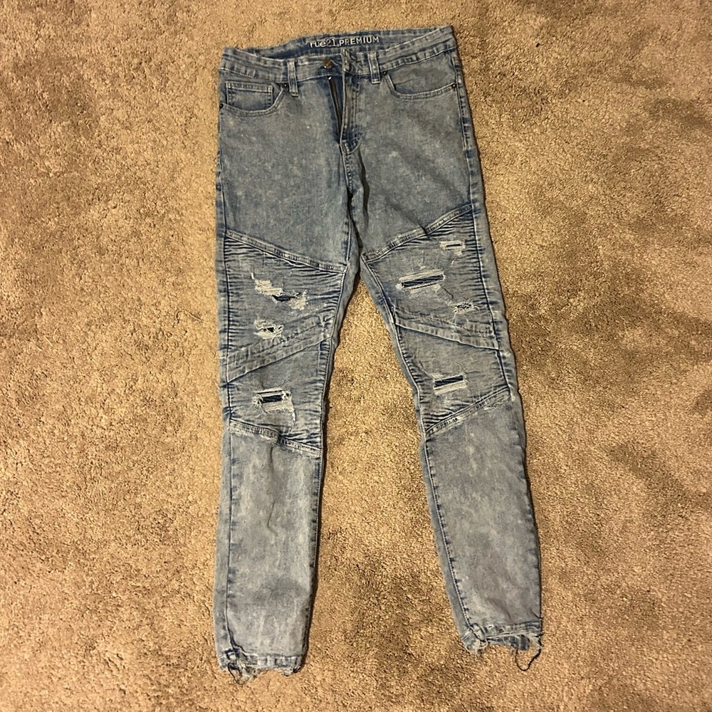 Ripped blue jeans
